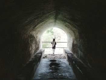 Rear view of woman tunnel