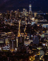 Illuminated cityscape at night