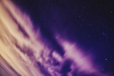 Low angle view of stars against sky at night