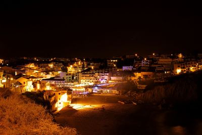 View of illuminated buildings at night