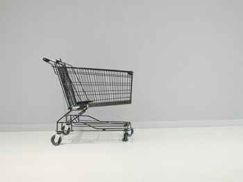 Side view of metallic structure against white background