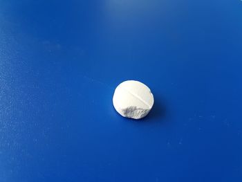 High angle view of ball on blue background