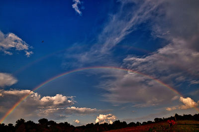 Low angle view of rainbow against sky