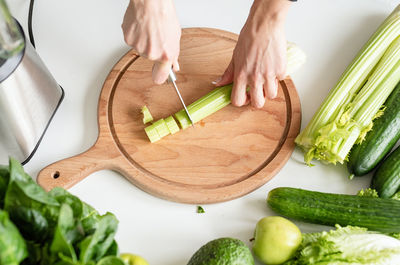 High angle view of chopped vegetables on cutting board