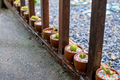 High angle view of various container on railing