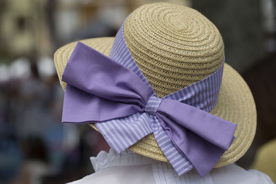 Rear view of woman wearing hat