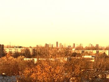 View of cityscape against clear sky