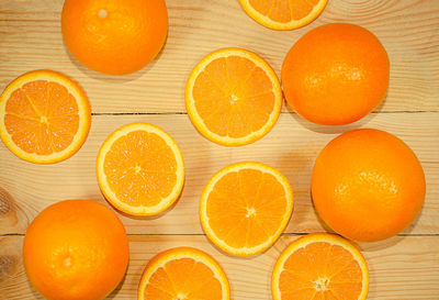 Directly above shot of orange fruits on table