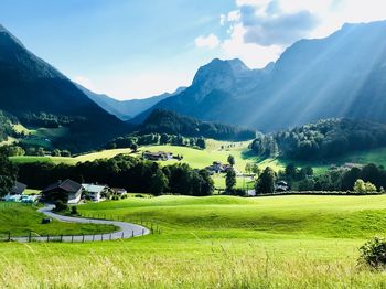 Scenic view of landscape and mountains against sky