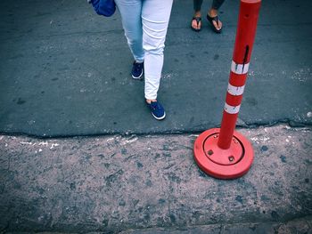 Low section of man standing on floor