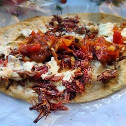 High angle view of pizza served on table