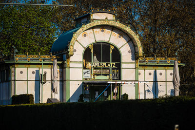 Low angle view of old building against clear blue sky