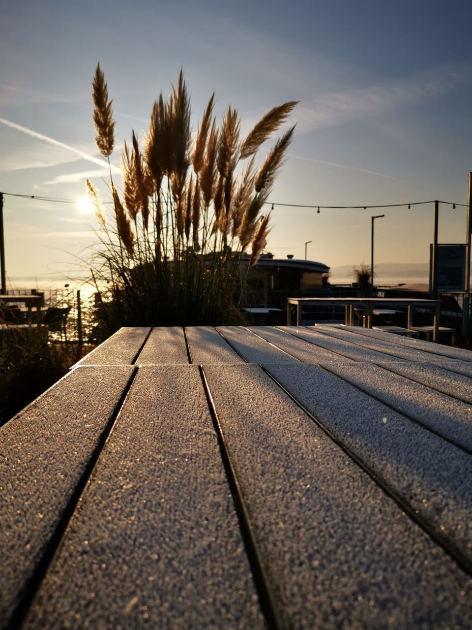 VIEW OF RAILROAD TRACKS AGAINST SKY