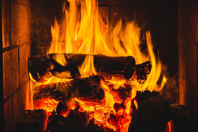 Close-up of fire burning at night