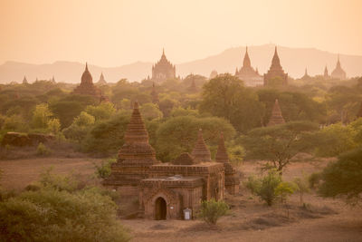 Old ruins of temples against clear sky