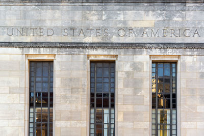 Text carved on government building