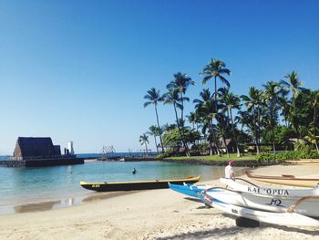 Scenic view of sea against clear blue sky