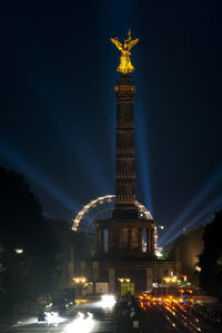 Low angle view of statue at night