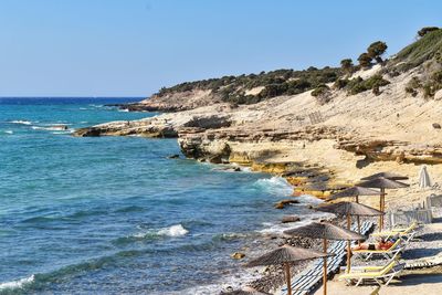 Scenic view of sea against clear blue sky