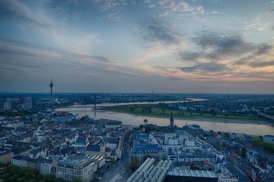 High angle view of buildings against sky during sunset