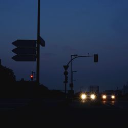 Road against sky at night