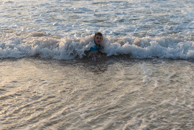 Portrait of young woman on beach