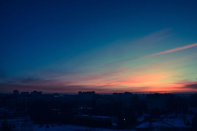 Cityscape against sky at night