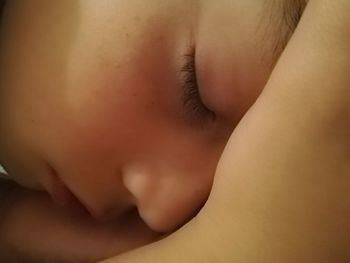 Close-up of boy sleeping