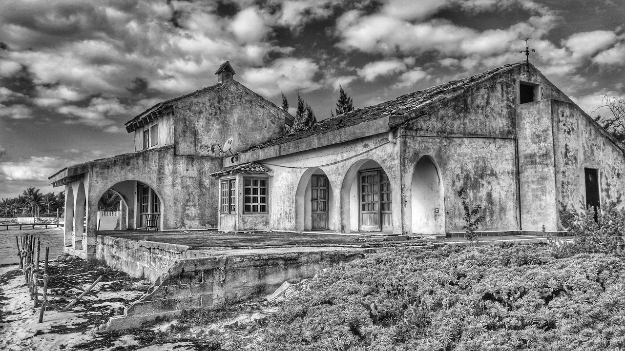 architecture, building exterior, built structure, sky, church, cloud - sky, religion, place of worship, spirituality, cloudy, cloud, old, low angle view, history, arch, day, outdoors, cathedral