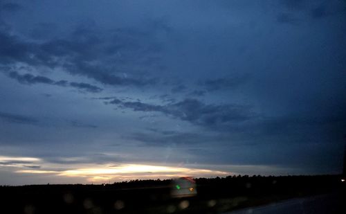 Scenic view of dramatic sky during sunset