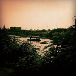 Scenic view of river against clear sky