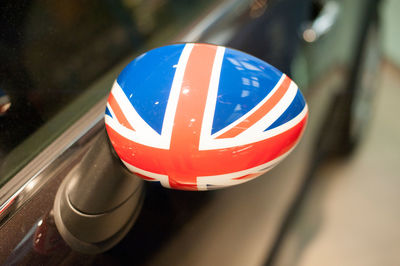 Close-up of painted flag on car