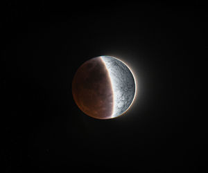 Scenic view of moon against sky at night