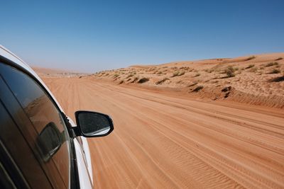 Scenic view of desert against clear sky