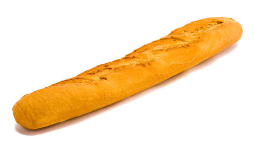 Close-up of bread against white background