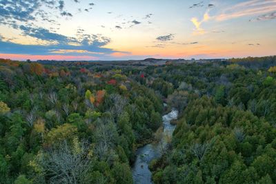 Scenic view of landscape against sky during sunset