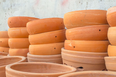 Stack of pots for sale at market stall