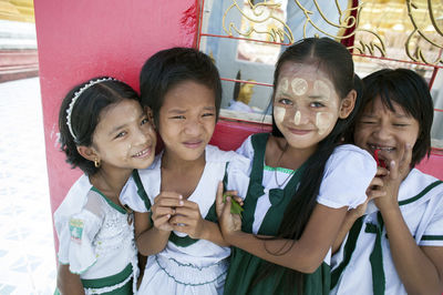 Portrait of happy friends smiling