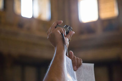 Close-up of woman holding hands