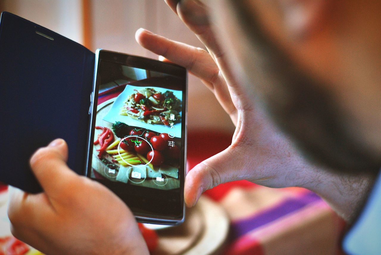 person, indoors, holding, part of, lifestyles, human finger, cropped, leisure activity, men, wireless technology, technology, communication, personal perspective, unrecognizable person, selective focus, close-up