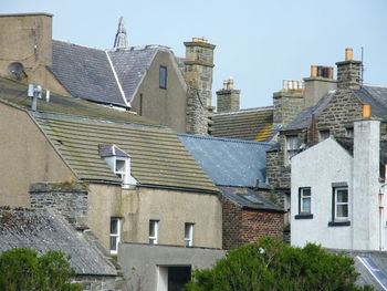 Buildings against clear sky in city