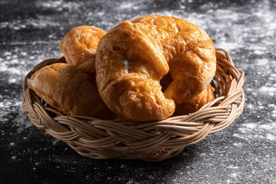 High angle view of bread in basket on table