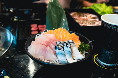 Close-up of fish in plate on table