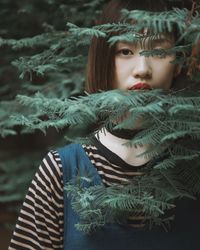 Portrait of young woman looking away