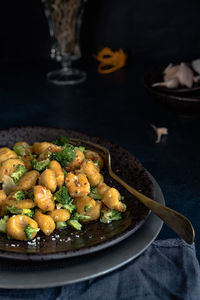 Close-up of gnocchi in plate on table