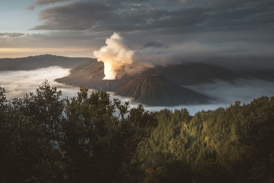 Scenic view of mountains against sky during sunset