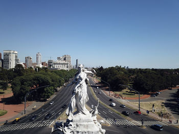 High angle view of city street against clear sky
