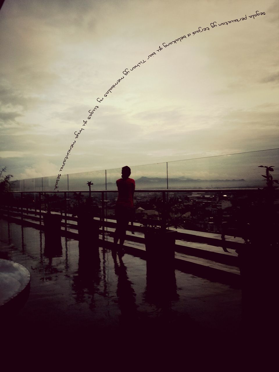 water, silhouette, sky, lifestyles, full length, men, leisure activity, rear view, sunset, cloud - sky, standing, railing, sea, reflection, person, pier, cloud