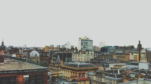 Cityscape against clear sky