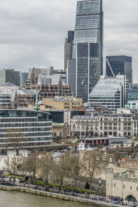 Modern buildings in city against sky